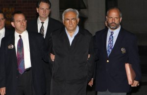 sarkozy out... 712520_dominique-strauss-kahn-head-of-the-imf-departs-a-new-york-police-department-precinct-in-new-york-e4e12