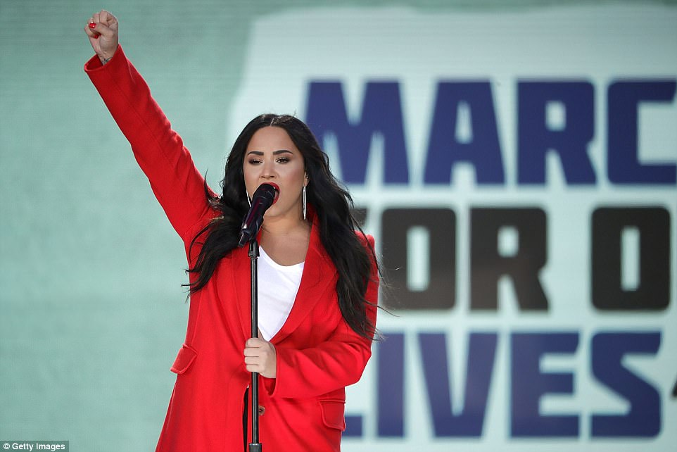 The Serious Side - part 4 - Page 20 4A83324A00000578-5539363-Demi_Lovato_also_sang_at_the_Washington_DC_march_on_Saturday_as_-m-198_1521910920927