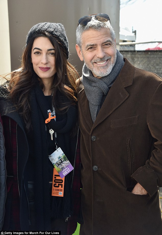 George and Amal Clooney at the March for our Lives 4A82CF3300000578-0-image-m-48_1521921396887
