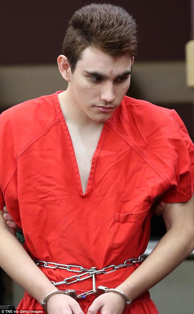 The Serious Side - part 6 4AAB425600000578-5558765-Florida_shooter_Nicholas_Cruz_is_led_into_court_this_month_He_sh-a-74_1522332676400