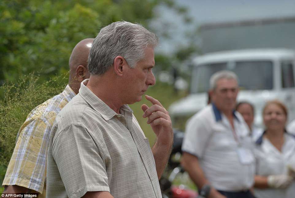 The Serious Side - part 6 - Page 6 4C68DD3D00000578-5745945-Cuban_President_Miguel_Diaz_Canel_center_arrives_at_the_site_of_-a-47_1526675667903