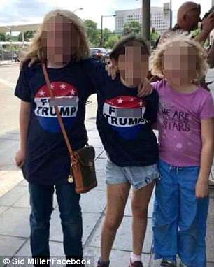 The Serious Side - part 6 - Page 12 4DEC31BC00000578-5918345-The_parents_of_two_girls_seen_wearing_f_Trump_t_shirts_at_a_prot-a-69_1530722625629