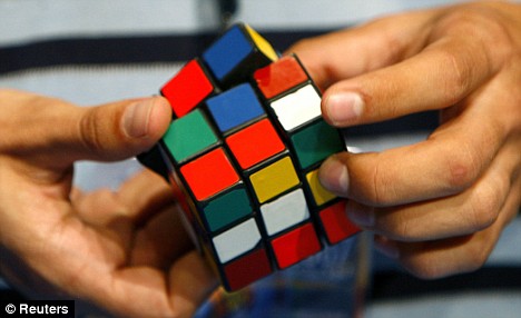 It's back to the Eighties as parents are set to scramble for Rubik's Cube this Christmas . Article-0-01E415EC000004B0-415_468x286