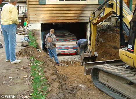 Man builds Lamborghini in his cellar... but needs digger to drive it out . Article-1083186-025A940F000005DC-678_468x343