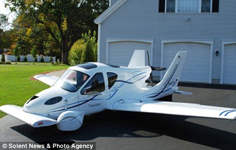 Mirror, signal, lift-off: Car that turns into a plane in 15 seconds prepares for take-off Article-1112105-03055C07000005DC-808_468x297