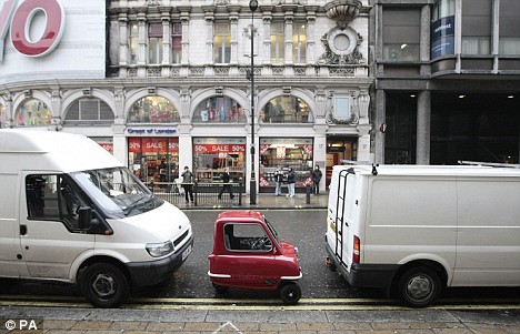 Pictured: The world's smallest car gets out of a tight squeeze Article-1137269-034F45C0000005DC-467_468x301