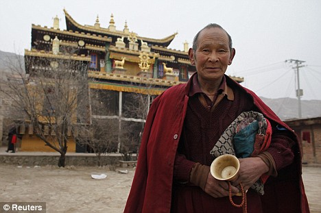 Is it a miracle? Monk who prays so much he has left footprints ingrained in the FLOOR Article-1155980-03ACF031000005DC-24_468x311