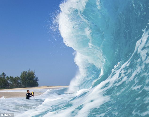 Pictured: The daredevil surfer taking amazing photos from INSIDE huge breaking waves Article-1156222-03ACCDFD000005DC-233_634x499