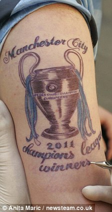 Fan gets Manchester City 2011 CL Winners Tattoo, left backfired Article-0-0974F7EB000005DC-193_224x423