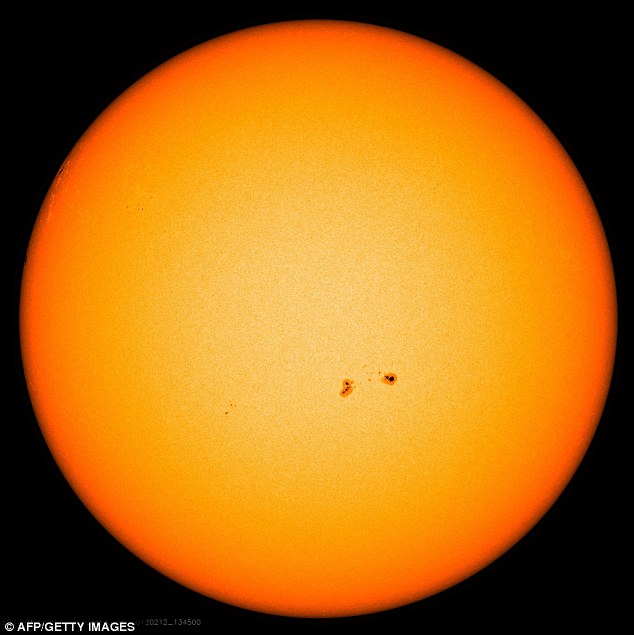 Massive sunspot that has doubled in size could send solar storms toward Earth Article-2100082-11B27DA5000005DC-819_634x635