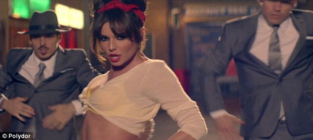 A sex siren who leaves a trail of besotted men in her wake: Cheryl Cole's new retro video shows vampish side to the singer Article-2179369-143A5E0E000005DC-138_634x283