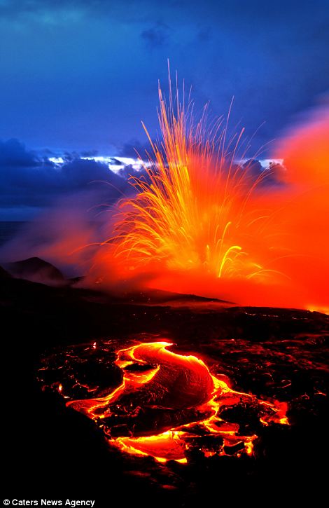 "Photographers brave boiling waters to capture the drama of ... lava crashing into the sea off Hawaii"  Article-2198591-14D87B93000005DC-223_470x725