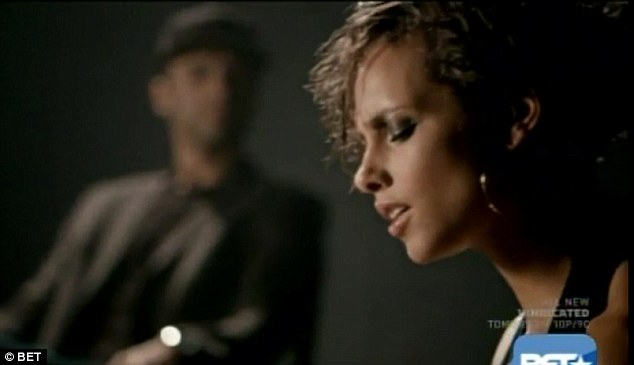 Alicia Keys goes back to her roots with curly locks in Brand New Me video... as she shows off her figure in plunging neckline Article-2249778-168F92FF000005DC-9_634x365