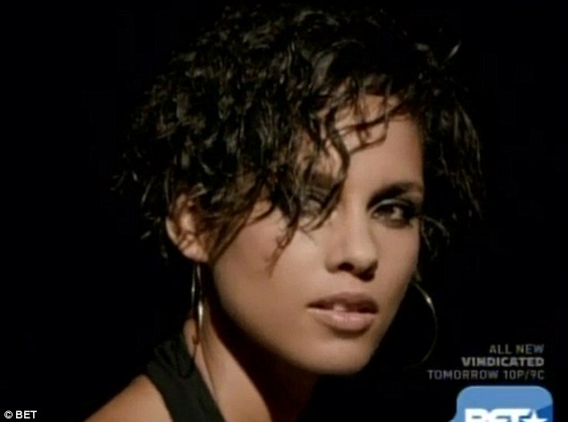 Alicia Keys goes back to her roots with curly locks in Brand New Me video... as she shows off her figure in plunging neckline Article-2249778-168F9307000005DC-415_634x471