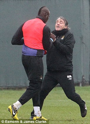 Balotelli and Mancini in stunning training ground bust-up Article-0-16BCC4D2000005DC-873_306x423