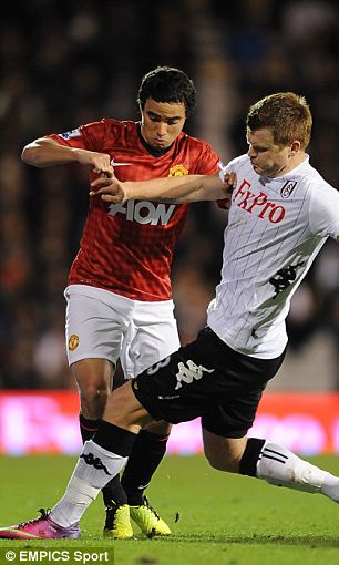 So why did Man United defender Rafael wear twin brother Fabio's boots against Fulham?  Article-0-174EC861000005DC-114_306x510