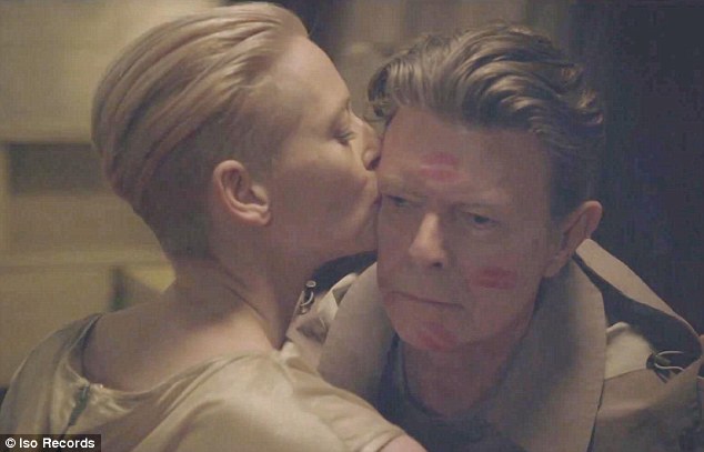 VIDEO - David Bowie is showered with kisses from an androgynous Tilda Swinton in  edgy new video The Stars (Are Out Tonight) Article-2284597-184CEE57000005DC-645_634x407