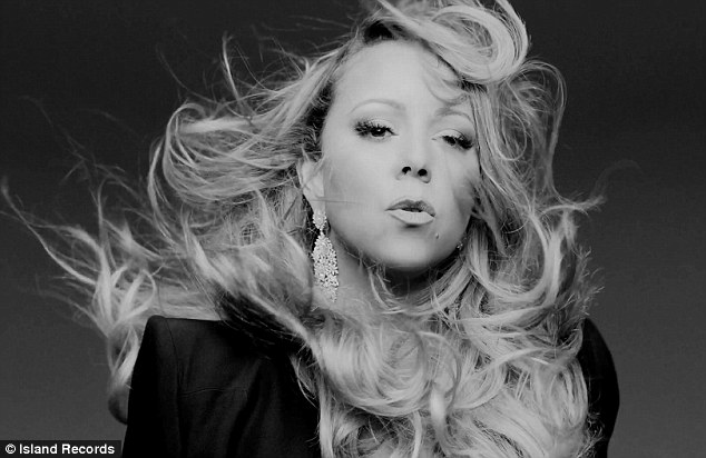  VIDEO -  Mariah Carey keeps it simple in slinky black in new video to Oz: The Great  And Powerful soundtrack Almost Home Article-2290435-1886B8FA000005DC-214_634x412