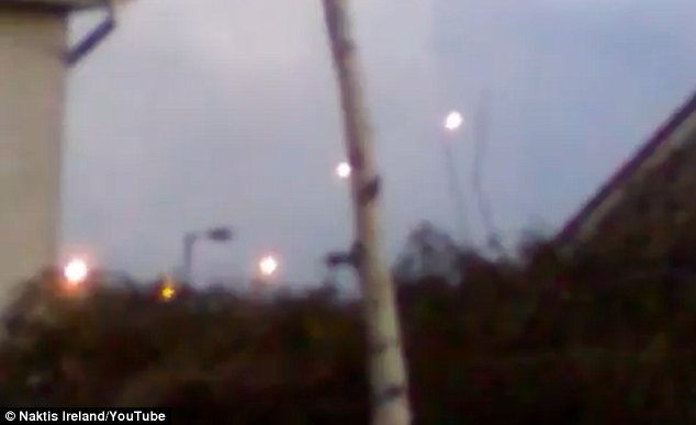 Have aliens landed in Ireland? ‘UFO spotter’ posts mysterious video of glowing fireballs floating  Article-0-196DD29E000005DC-612_634x387