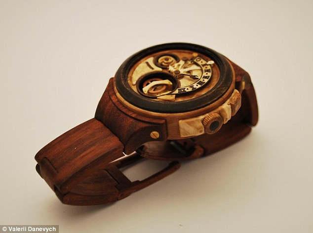 Carpenter carves functioning watches entirely out of wood, even the movement! Article-2329082-19EE8929000005DC-324_634x472