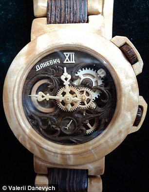 Carpenter carves functioning watches entirely out of wood, even the movement! Article-2329082-19EE89DC000005DC-465_306x392