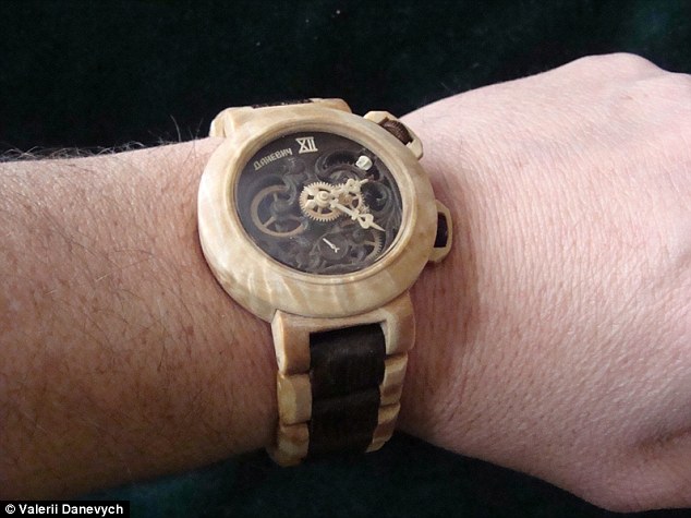 Carpenter carves functioning watches entirely out of wood, even the movement! Article-2329082-19EE8A01000005DC-324_634x475