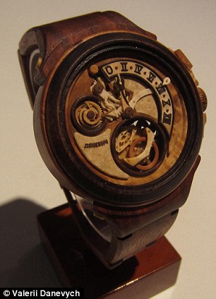 Carpenter carves functioning watches entirely out of wood, even the movement! Article-2329082-19EE8C79000005DC-293_306x423