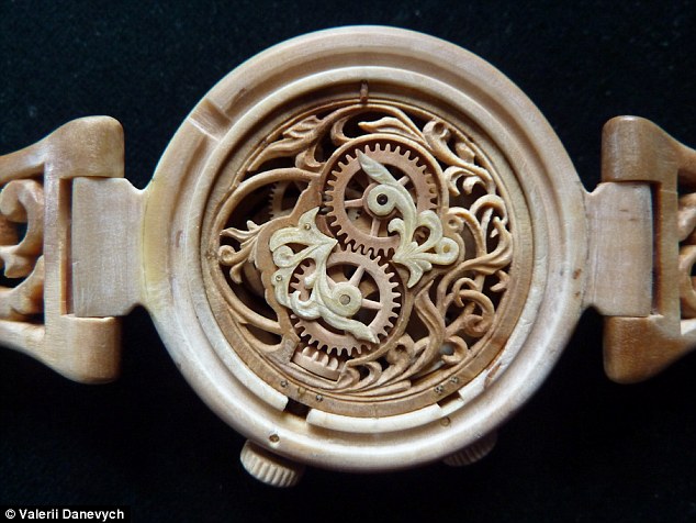 Carpenter carves functioning watches entirely out of wood, even the movement! Article-2329082-19EE8E55000005DC-680_634x476