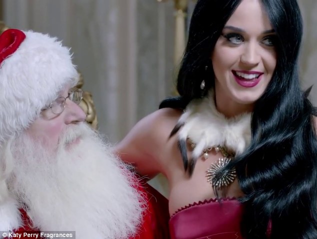 VIDEO - Have you been naughty or nice Katy? Miss Perry sits on Santa's lap in new Christmas advert for her perfume Killer Queen Article-2513754-19A6C1DE00000578-276_634x478