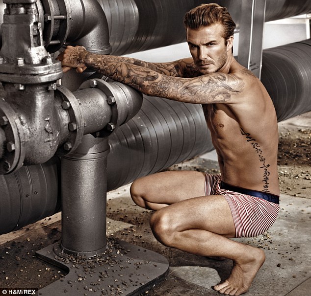 VIDEO - Becks back in his kecks! David smoulders as he strips off for latest H&M underwear campaign Article-0-1AE8EC0C00000578-986_634x605