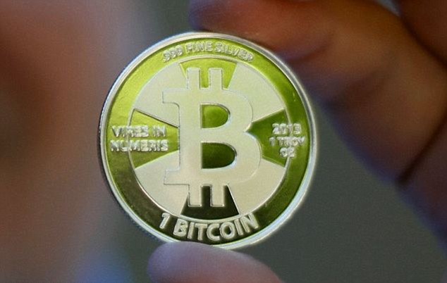 New York to regulate Bitcoins following hearing where Winklevoss twins testified about the risks of digital currency - just days after their business partner was arrested on money laundering charges Article-0-1B0B192200000578-386_634x402