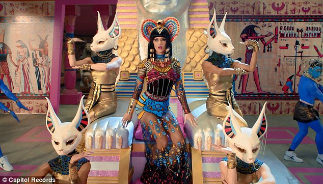 She's a man-eater! Katy Perry straddles a stripper pole as she transforms into evil Egyptian queen for new Dark Horse music video  Article-2564321-1BAFAC1B00000578-763_634x361