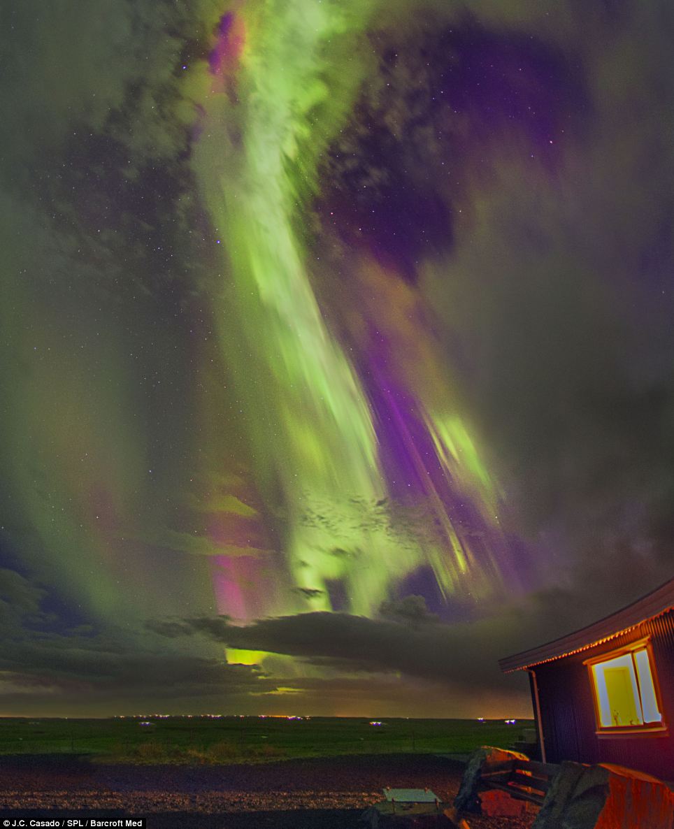 Lighting up the sky! Dragon's head appears from magical Northern Lights in the Arctic Circle Article-2566374-1BC254AF00000578-958_964x1186