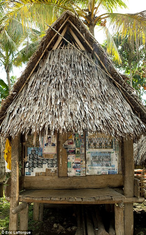 Love shack: Each village has a special hut for teenagers who want to make love to their boyfriends and girlfriends - the doors are plastered with safe sex stickers