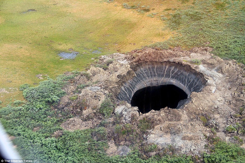 TWO MORE Giant Holes Appear in Russia Article-2696953-1FBF274B00000578-304_964x641