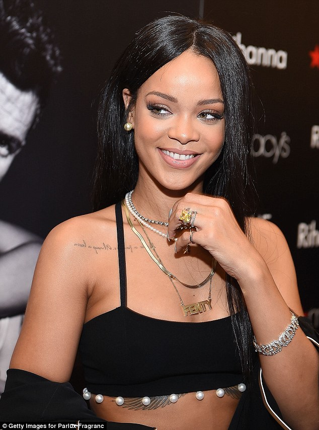 Rihanna flashes some flesh as she launches cologne line 1414278784520_Image_galleryImage_ATLANTA_GA_OCTOBER_25_Rec
