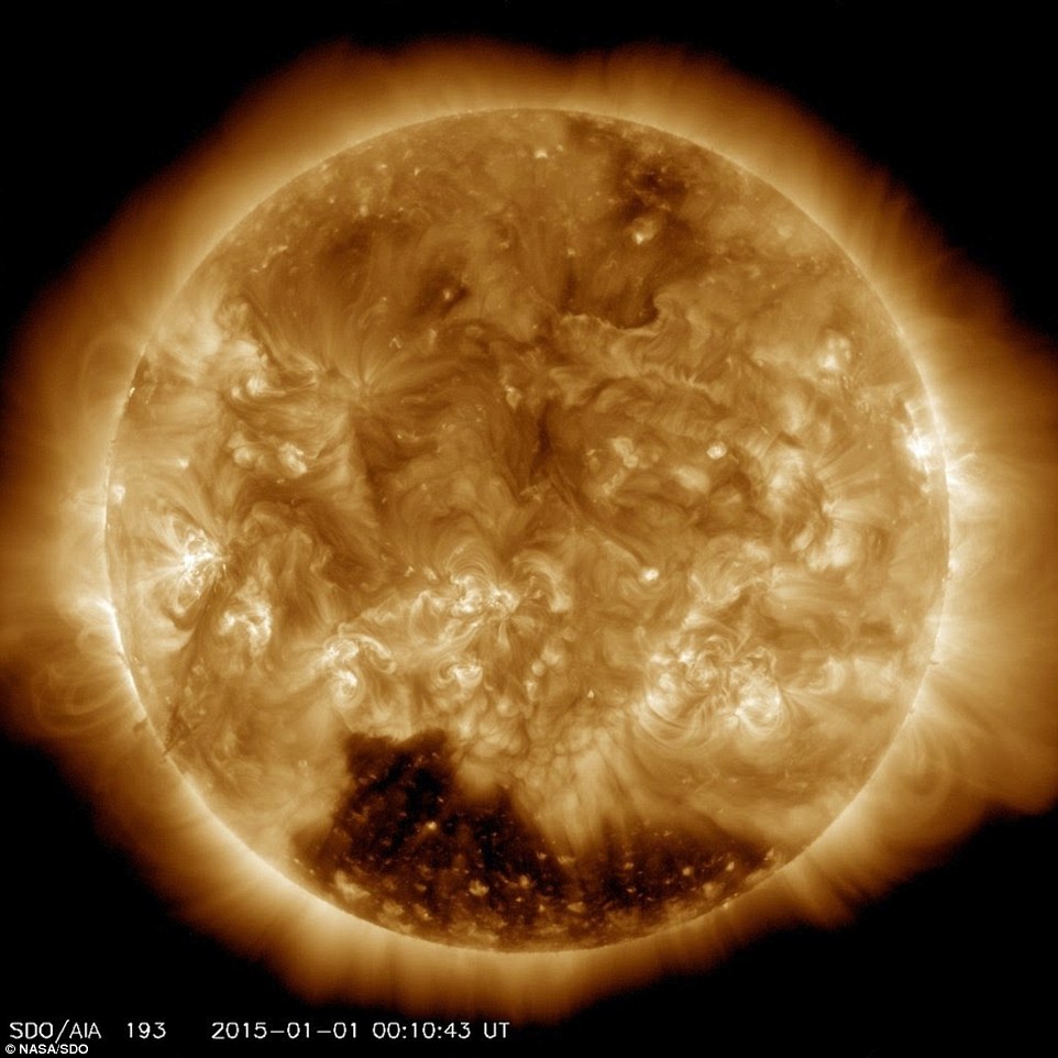 Mystery at the sun’s south pole: Nasa reveals huge ‘coronal hole’ on the solar surface where winds reach 500 miles per SECOND 24616BA700000578-0-image-a-1_1420227546028