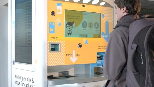 Kiosk that turns unwanted foreign currency into pounds Video-undefined-294CCF5A00000578-420_636x358