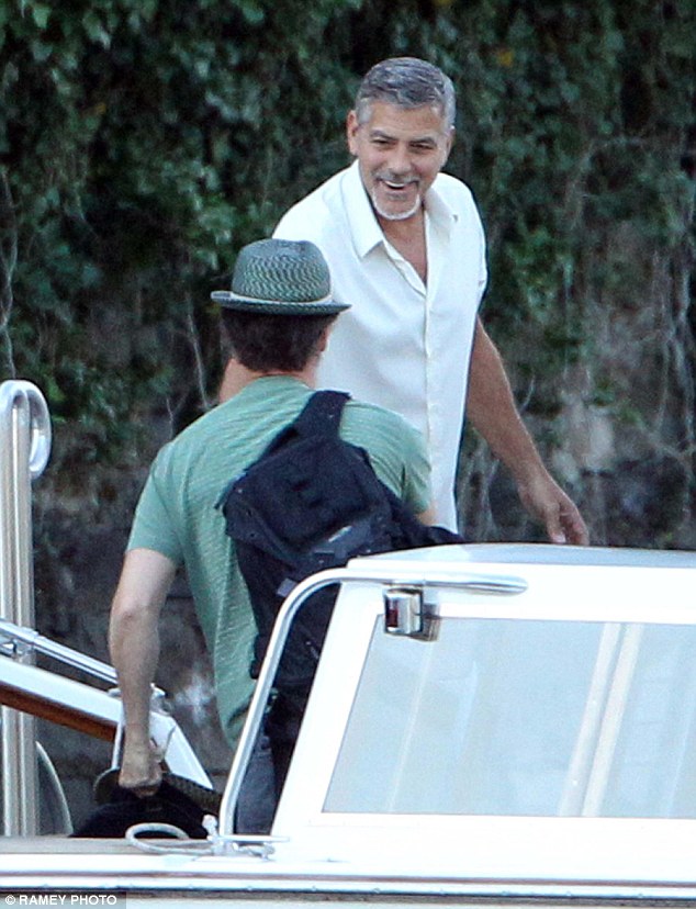 05. August 2015: George Clooney welcoming Edward Norton and family to Villa d'Oleandra 2B209C1800000578-3186334-image-a-33_1438803701357