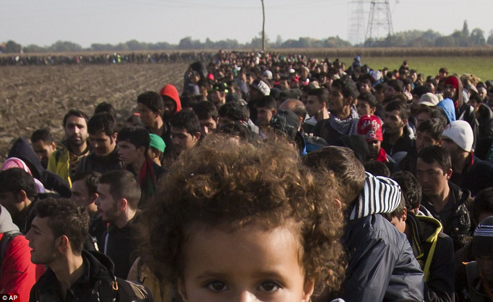 On the march to western Europe: Shocking pictures show thousands of determined men, women and childr 2DC6150100000578-3289031-image-a-44_1445805101939