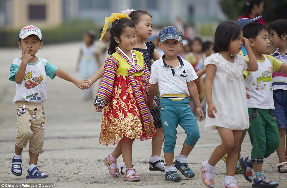 Cum este de fapt viața în Coreea de Nord 2EB96C8900000578-3330557-A_group_of_children_are_part_of_National_Day_in_August_in_the_ca-m-2_1448353907222