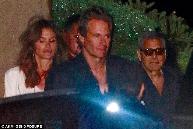 06. March 2016: Party of three: George Clooney enjoys a relaxed evening out in Malibu with Cindy Crawford and her husband Rande Gerber 31E9DA7700000578-0-image-a-2_1457252508241