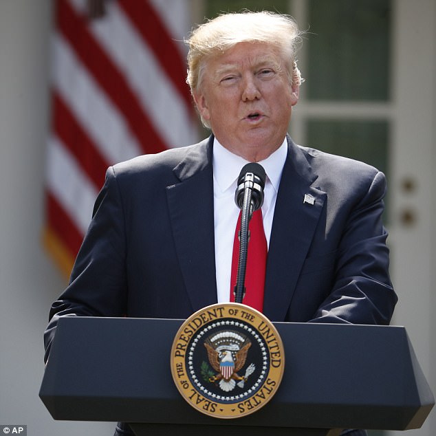 Trump pulls U.S. out of climate accord saying it is a foreign attempt to seize American jobs and American wealth  Read more: http://www.dailymail.co.uk/news/article-4563932/Trump-announces-U-S-Paris-c 41022F0E00000578-4563932-image-a-56_1496345997583