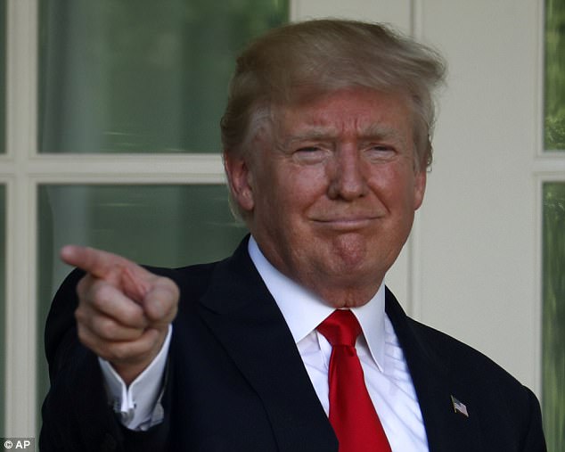 Trump pulls U.S. out of climate accord saying it is a foreign attempt to seize American jobs and American wealth  Read more: http://www.dailymail.co.uk/news/article-4563932/Trump-announces-U-S-Paris-c 4102585E00000578-4563932-image-a-10_1496349664323