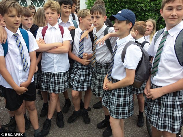 Schoolboys turn up for class dressed in SKIRTS in protest over strict no-shorts uniform policy despite heatwave  41A1A1B300000578-0-image-a-10_1498126033518