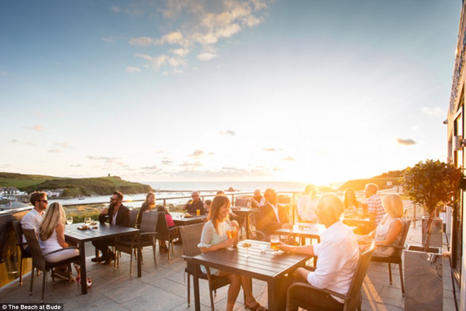 Are these the best tables in Britain? The most stunning restaurant views in the country revealed (from dramatic cityscapes to awe-inspiring Highland mountains)  430D3BB300000578-4768316-Situated_right_on_the_coast_in_North_Cornwall_The_Beach_at_Bude_-a-26_1502615860956