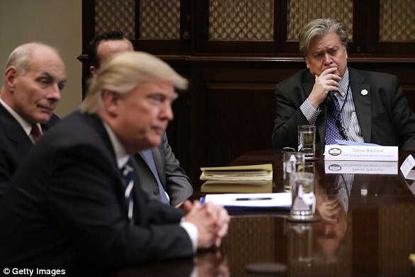 The Serious Side - part 4 - Page 9 47BB1E9100000578-5232903-White_House_Chief_Strategist_Steve_Bannon_R_listens_to_U_S_Presi-a-3_1515054721077