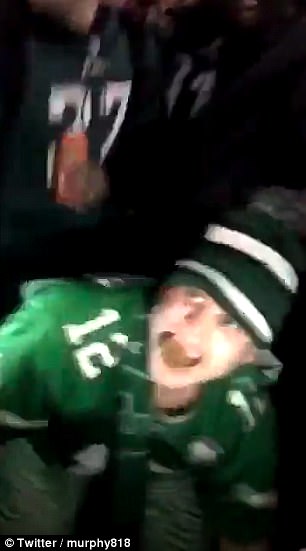 Disgusting moment Eagles fan eats HORSE POOP as Super Bowl celebrations descend into chaos in Philadelphia  48E56AC800000578-0-image-m-44_1517823445105