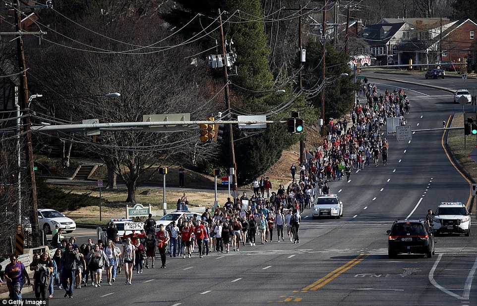 The Serious Side - part 4 - Page 14 4971928700000578-5419081-Students_from_Montgomery_Blair_High_School_in_Maryland_march_dow-a-137_1519248180390