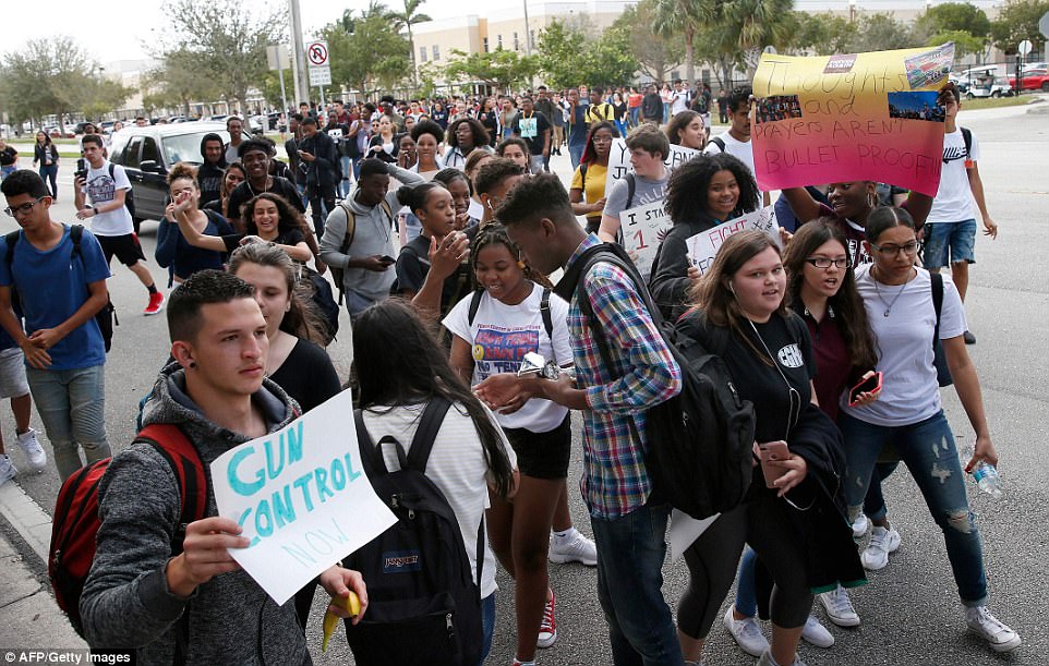 The Serious Side - part 4 - Page 14 4972C87D00000578-5419081-Thousands_of_students_across_Florida_walked_out_of_their_classro-a-128_1519248180098